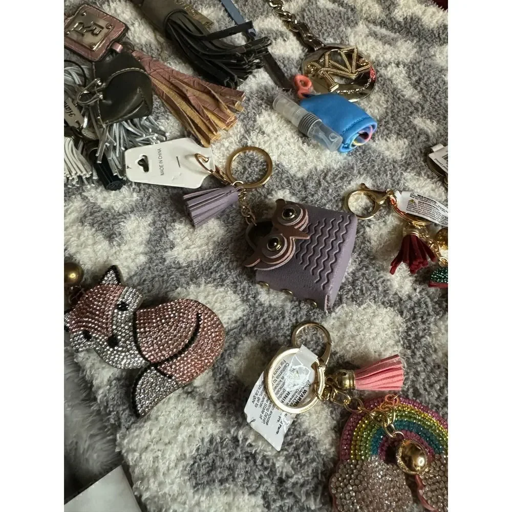 Lot of designer keychains,bag charms bling disney tassell